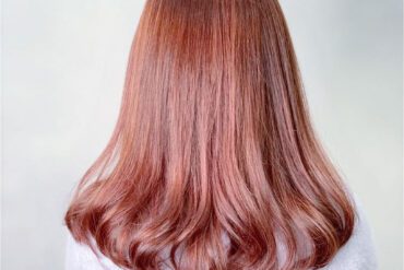 珊瑚粉髮尾內捲髮